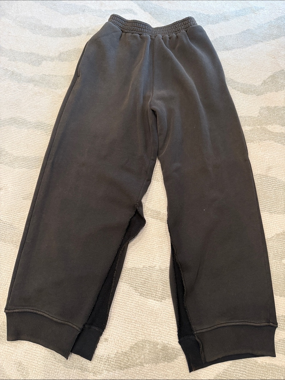 MM6 Margiela sweatpants with slits. Faded black, in some places has a brown tone